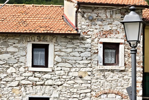 Colonnata, Carrara, Tuscany, Italy. House with walls in white Carrara marble in the town of Colonnata. The village, famous for its lard, is located in a valley of the Apuan Alps. Tuscany