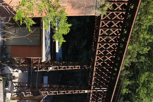 Iron bridge with reticular structure. The bridge was part of the ancient Carrara marble railway.