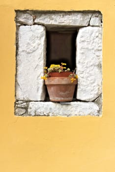 Colonnata, Carrara, Tuscany, Italy. Detail of windows and walls made of white marble extracted from the nearby quarries. Colonnata is famous for the production of tasty lard.