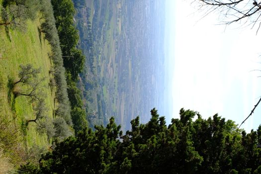 Panorama of the Assisi countryside with the road leading to the Hermitage of the Carceri used by St. Francis for prayers.