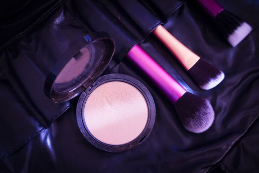 Facial makeup, eyeshadow and makeup brushes. No people
