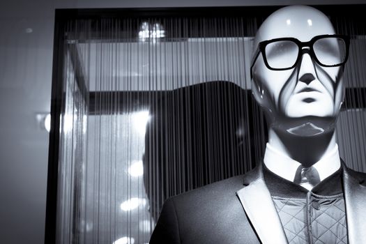 Male mannequin with glasses elegant dress. No people