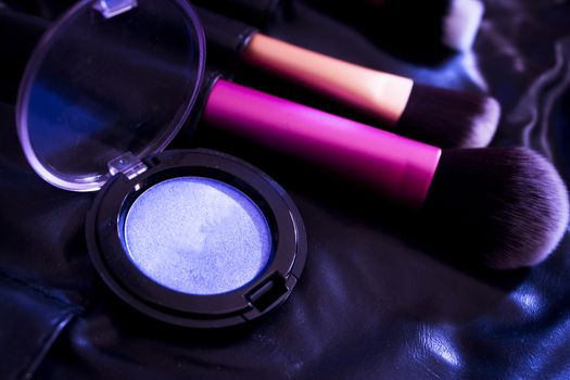 Facial makeup, eyeshadow and makeup brushes. No people