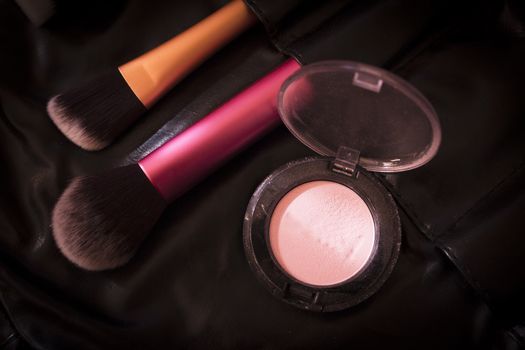 Facial makeup, eyeshadow and makeup brushes. No people