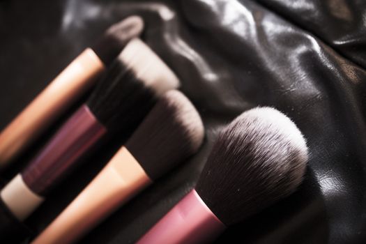 Facial makeup, eyeshadow and makeup brushes. No people