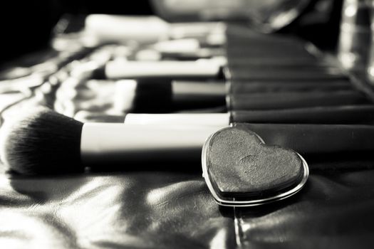 Facial makeup, eyeshadow and makeup brushes. No people