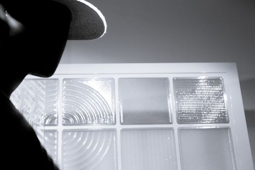 Black male mannequin without defined face with cap