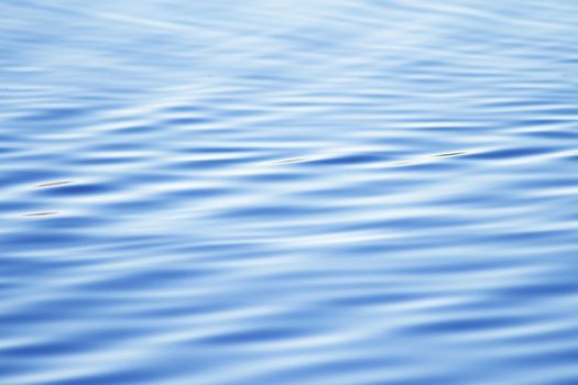 Lake water with ripples produced by wind. No people