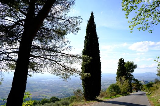 Panorama of the Assisi countryside with the road leading to the Hermitage of the Carceri used by St. Francis for prayers.