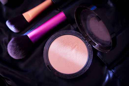 Facial makeup, eyeshadow and makeup brushes. No people
