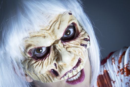 Woman dressed as a killer nurse for Halloween night