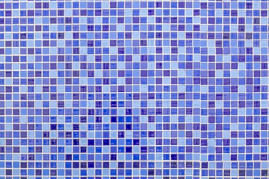 Blue ceramic tile mosaic in swimming pool