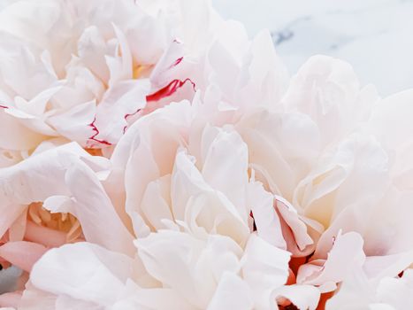 Bouquet of peony flowers on luxury marble background, wedding flatlay and event branding design