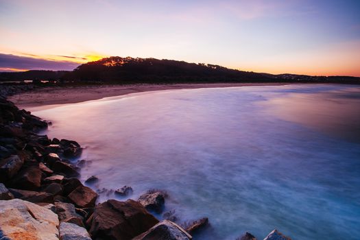 A beautiful sunset from Bar Beach North in Narooma, NSW, Australia