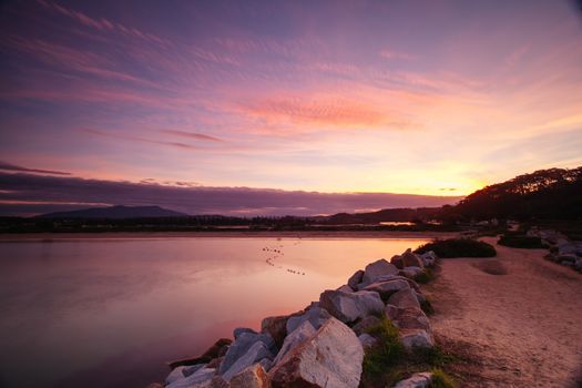 A beautiful sunset from Bar Beach North in Narooma, NSW, Australia