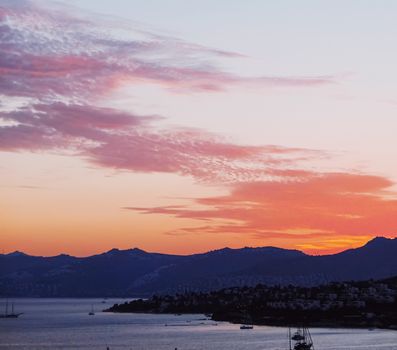 Beautiful sea view and mountains in the Mediterranean at sunset, summer vacation travel and holiday destination