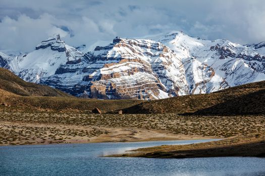 Himalayas mountains and mountain lake Dhankar Lake. Spiti Valley, Himachal Pradesh, India