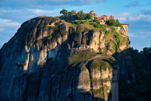 Great Meteoron Monastery perched on a cliff in famous greek tourist destination Meteora in Greece on sunrise