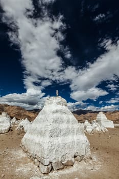 Whitewashed chortens (Tibetan Buddhist stupas). Nubra valley, Ladakh, India