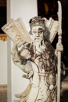 Wat Pho Chinese stone guardian, Bangkok, Thailand