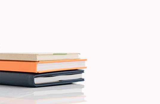 Stacked book on isolated white background