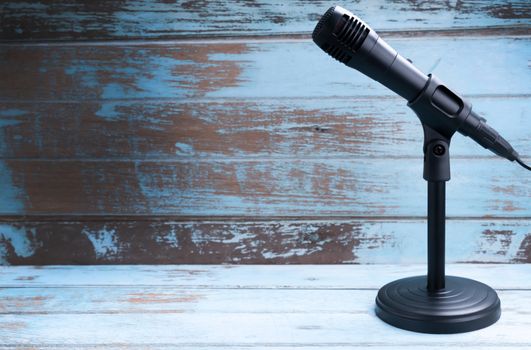 Microphone with stand on vintage background