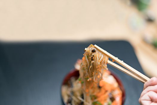 Konjac with shrimp and chopstick.  Japan food concept