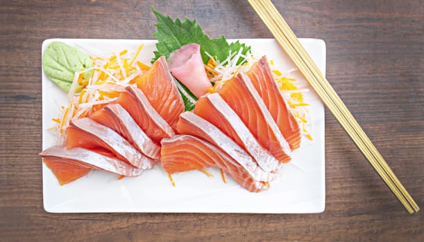Top view Salmon Sashimi on table.  Japan food concept