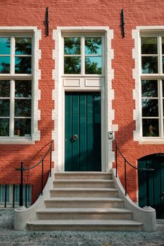 Brugge door with doorstep and window of an old Eurupean house. Bruges, Belgium