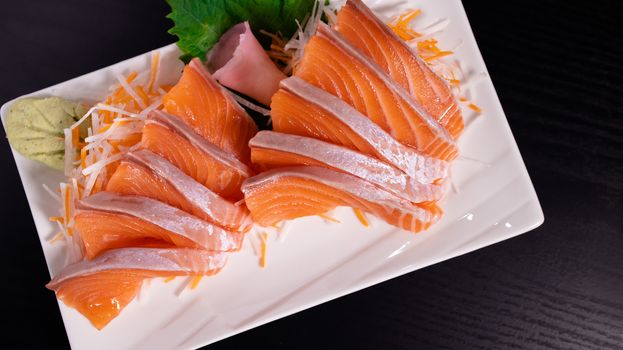 Top view Salmon Sashimi on table.  Japan food concept