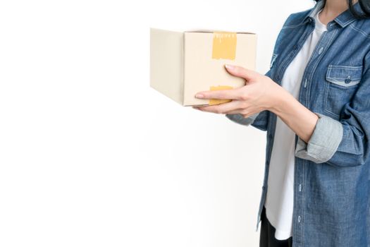 Delivery hand holding cardboard boxes.  Business online shopping concept