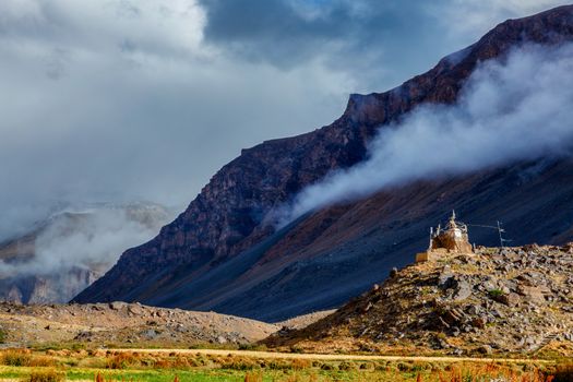Small Buddhist gompa in Spiti Valley in Himalayas. Himalayan scenic landscape of Himalayas mountains. Himachal Pradesh, India