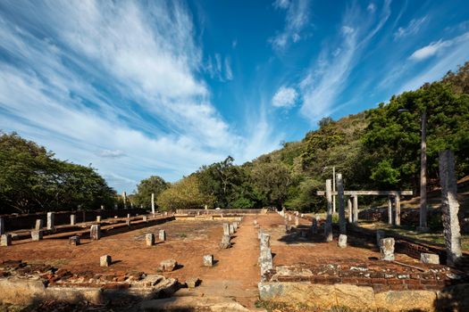 Relic house with Mihintale tablets, Mihintale, Sri Lanka. Ancient ruins pillars with inscriptions at Mahaseya Dagoba Buddhist monastery.