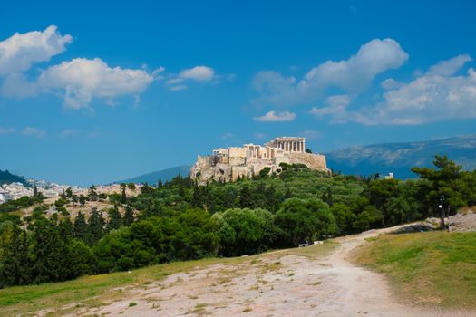 Famous greek tourist landmark - the iconic Parthenon Temple at the Acropolis of Athens as seen from Philopappos Hill, Athens, Greece