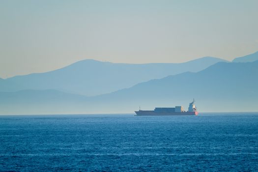 Cargo vessel ship in Aegean Sea Mediterranean sea. Greece