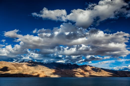 Himalayan nature high altitude lake Tso Moriri (official name Tsomoriri Wetland Conservation Reserve) on sunset with shadows from clouds, Korzok, Changthang area, Ladakh, Jammu and Kashmir, India