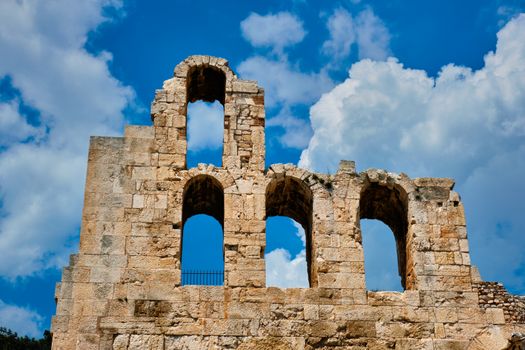 Ruins of Odeon of Herodes Atticus ancient stone Roman theater located on the southwest slope of the Acropolis hill of Athens, Greece. Athens, Greece