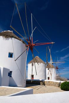 Scenic view of famous Mykonos town windmills. Traditional greek windmills on Mykonos island, Cyclades, Greece