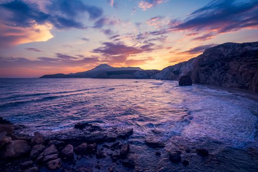Fyriplaka beach and waves of Aegean sea on sunset, Milos island, Cyclades, Greece