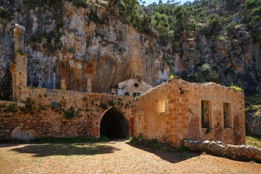 Riuns of abandoned Katholiko monastery church in Avlaki gorge, Akrotiri peninsula, Chania region on Crete island, Greece. Tracking shot
