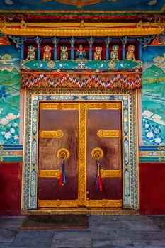 Door gate in Buddhist monastery. Mud village, Pin Valley, Himachal Pradesh, India