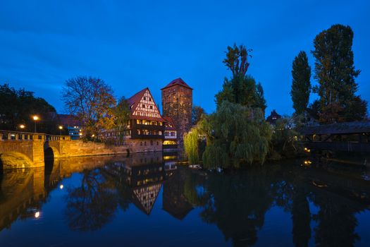 Nuremberg city houses on riverside of Pegnitz river from Maxbrucke (Max bridge). Nuremberg, Franconia, Bavaria, Germany