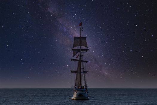 Antique tall ship, vessel leaving the harbor of The Hague, Scheveningen under a clear milky way sky
