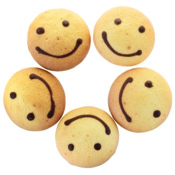 Round biscuit with smile image top view isolated on white background.