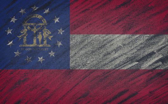 Close-up of national Georgia state flag painted with colored chalk on a blackboard.