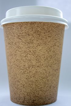 Take-out coffee in thermo cup. Isolated on a white