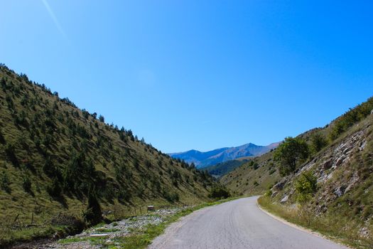 Road to the mountain Bjelasnica. Narrow road to the mountain. The natural beauty of Bosnia and Herzegovina.