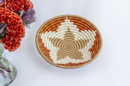 Wicker basket to arrange fruits and vegetables on a table.