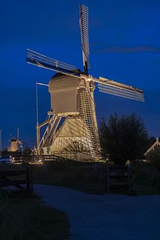 Majestic windmill against the bleu hour sunset in Alblasserdam city, Netherlands
