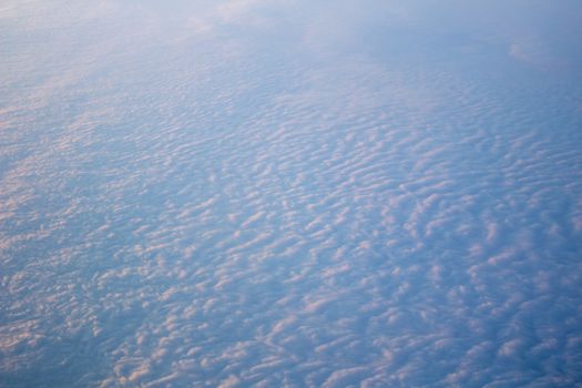 Wide cloud landscape aerial view from a plane.